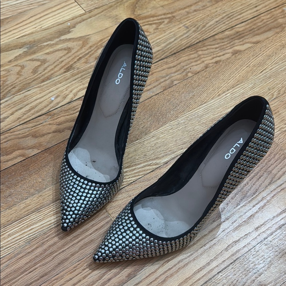 Studded black pumps